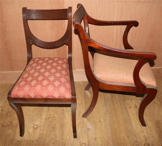A pair of Regency style carvers and a matching dining chair